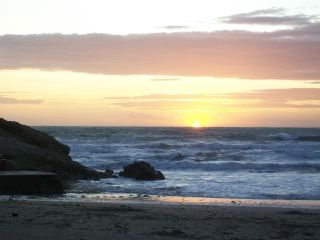 Sonnenuntergang berm Meer